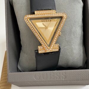 Guess watch, with original box and two different bracelets.  Price is firm.